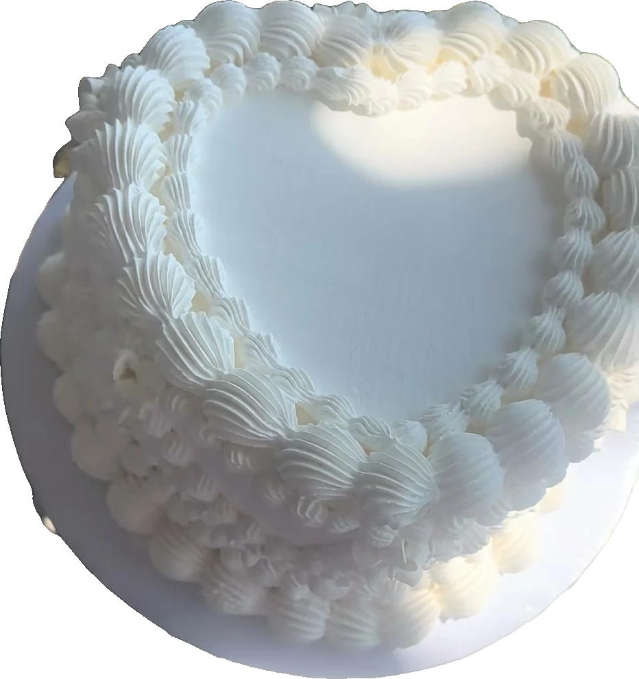 White vintage piped heart cake