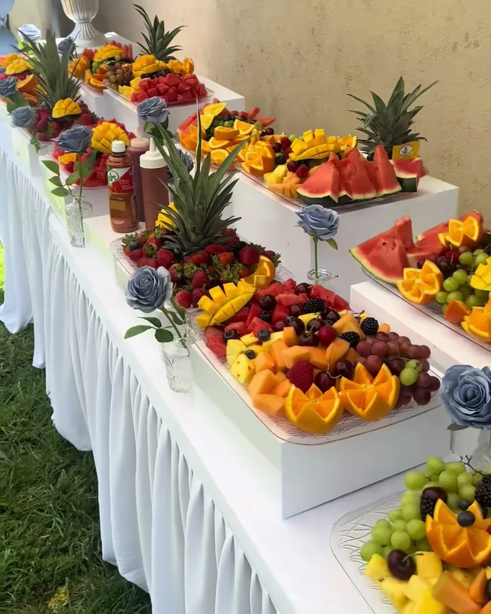 Quinceañera fruit table with fresh fruit arrangements