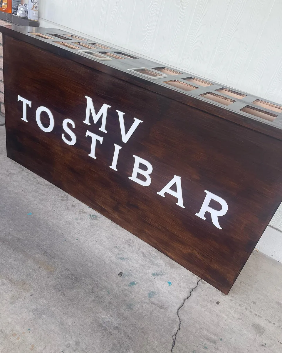 The MV Tostibar right after it was built, empty topping wells and fresh white lettering