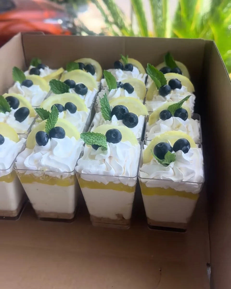 Cheesecake Shooters: Lemon or mixed berry, layered in cups for easy serving