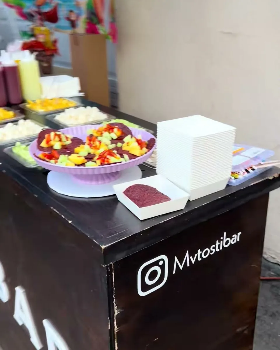 The Tostibar dressed for a Moana party with a fruit bowl and themed cups